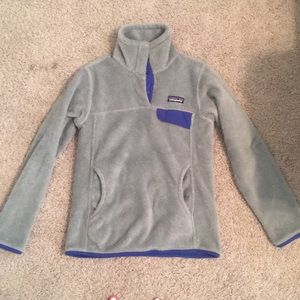 A blue and grey Patagonia pullover